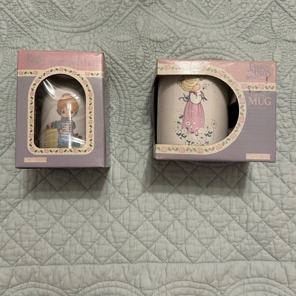 Vintage Precious Moments 2 piece lot consisting of a handle bell & ceramic mug